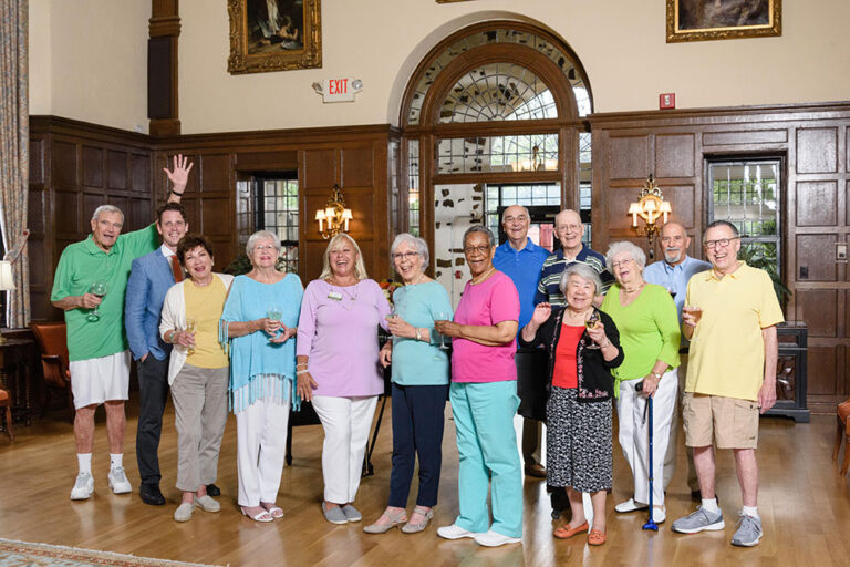 seniors standing with team members