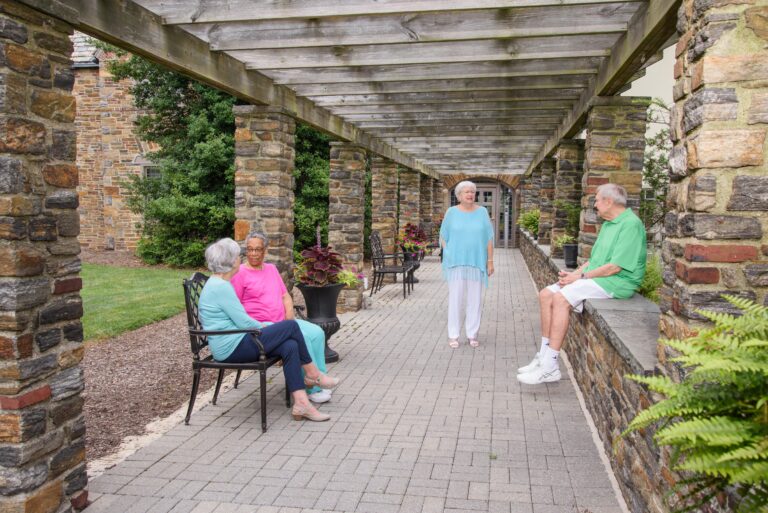 seniors sitting outside and socializing
