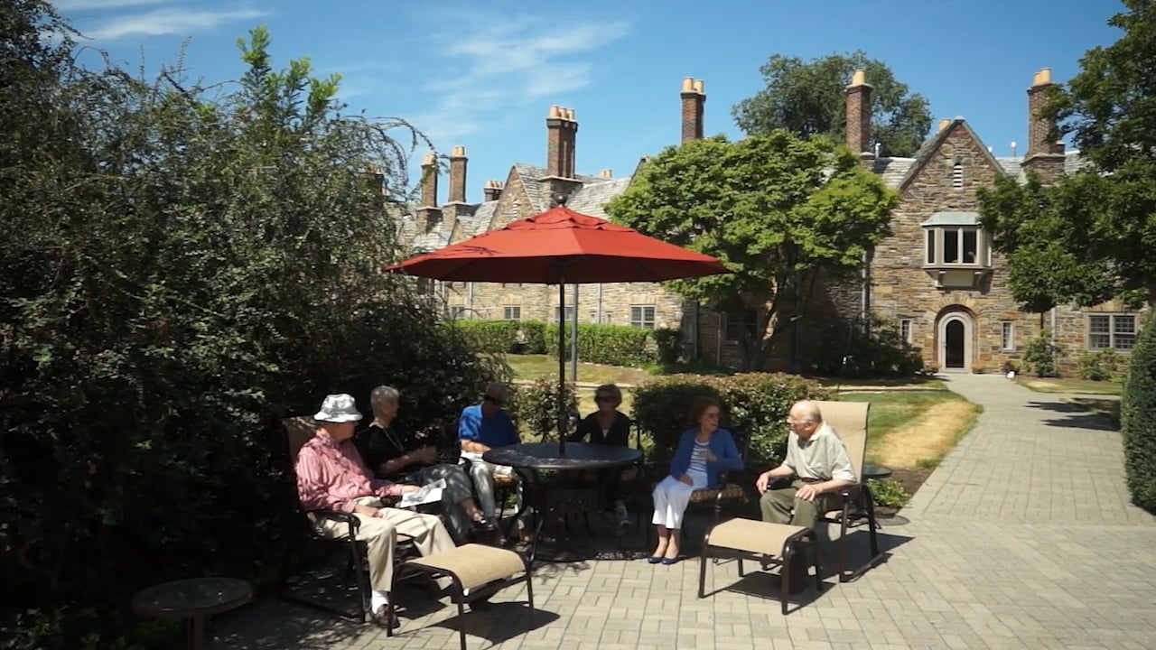 seniors socializing on the outside patio